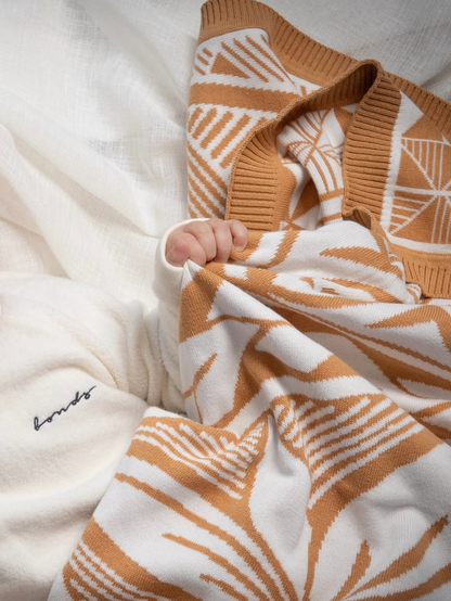 Couverture tricotée Alofa  Niu avec le bonnet à pompon assorti